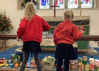 St Mabyn School pupils at church for harvest festival