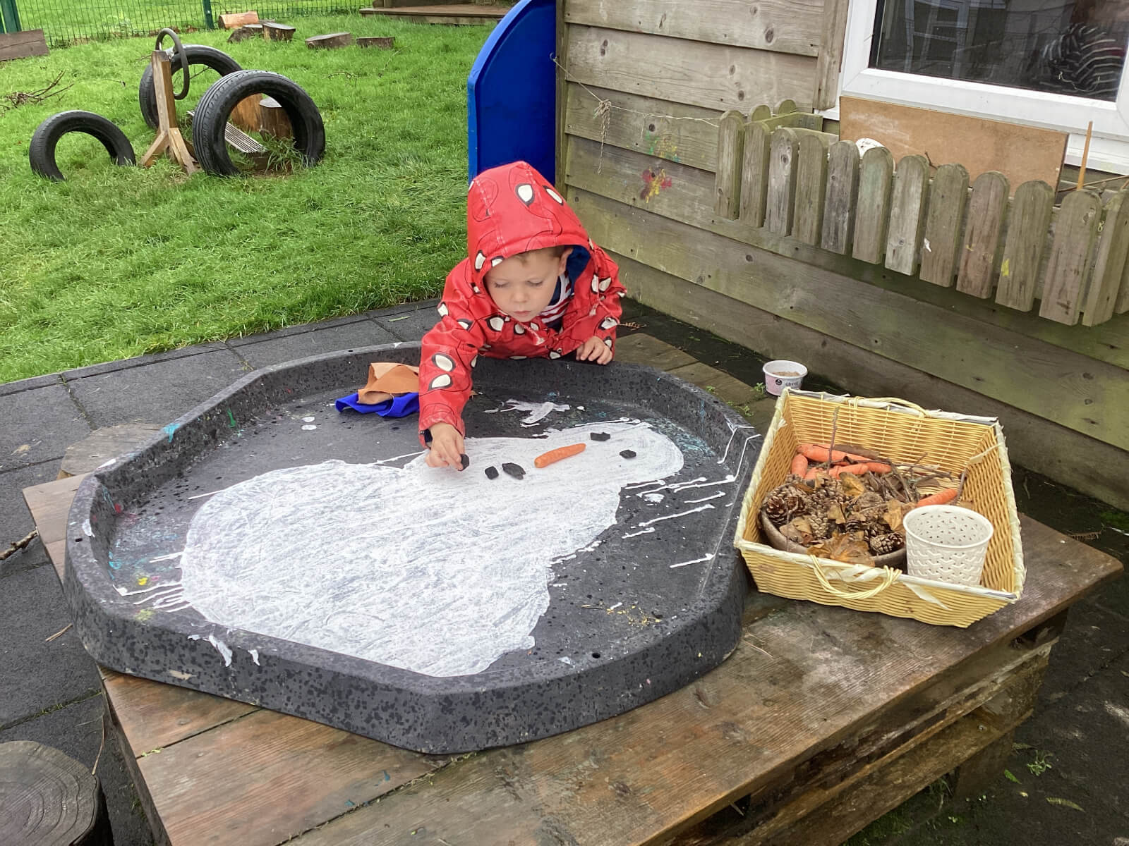 Antony School child making snowman