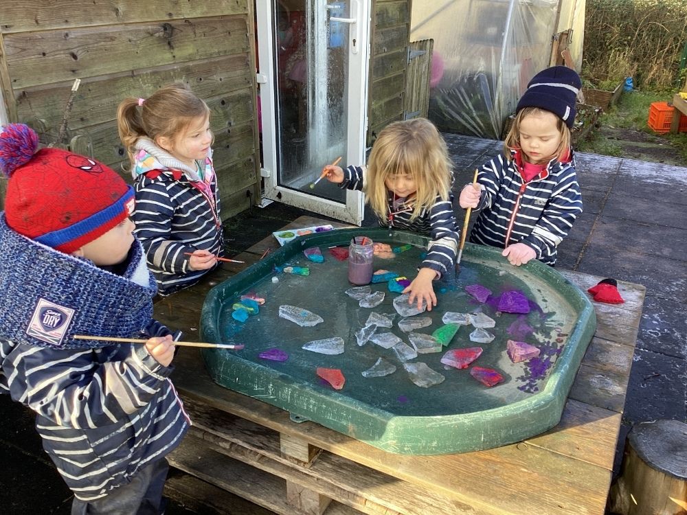 Antony School children outdoor play with paint