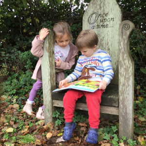 Quethiock Primary School Pupils reading outdoors