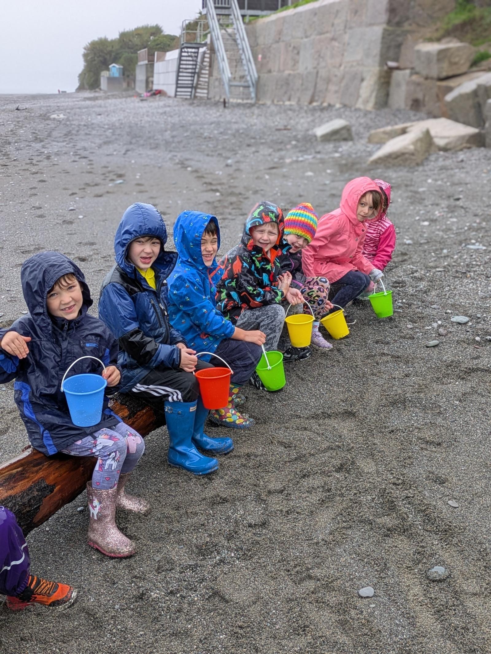 St Germans Primary Pupils with buckets on the beach