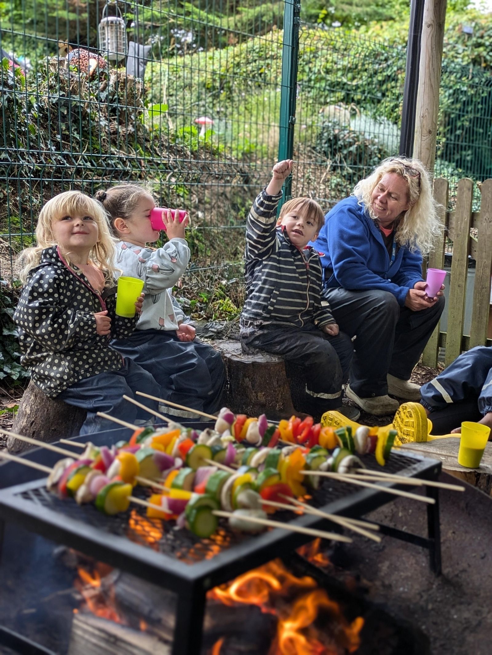 St Martin's Primary School pupils cooking on the fire