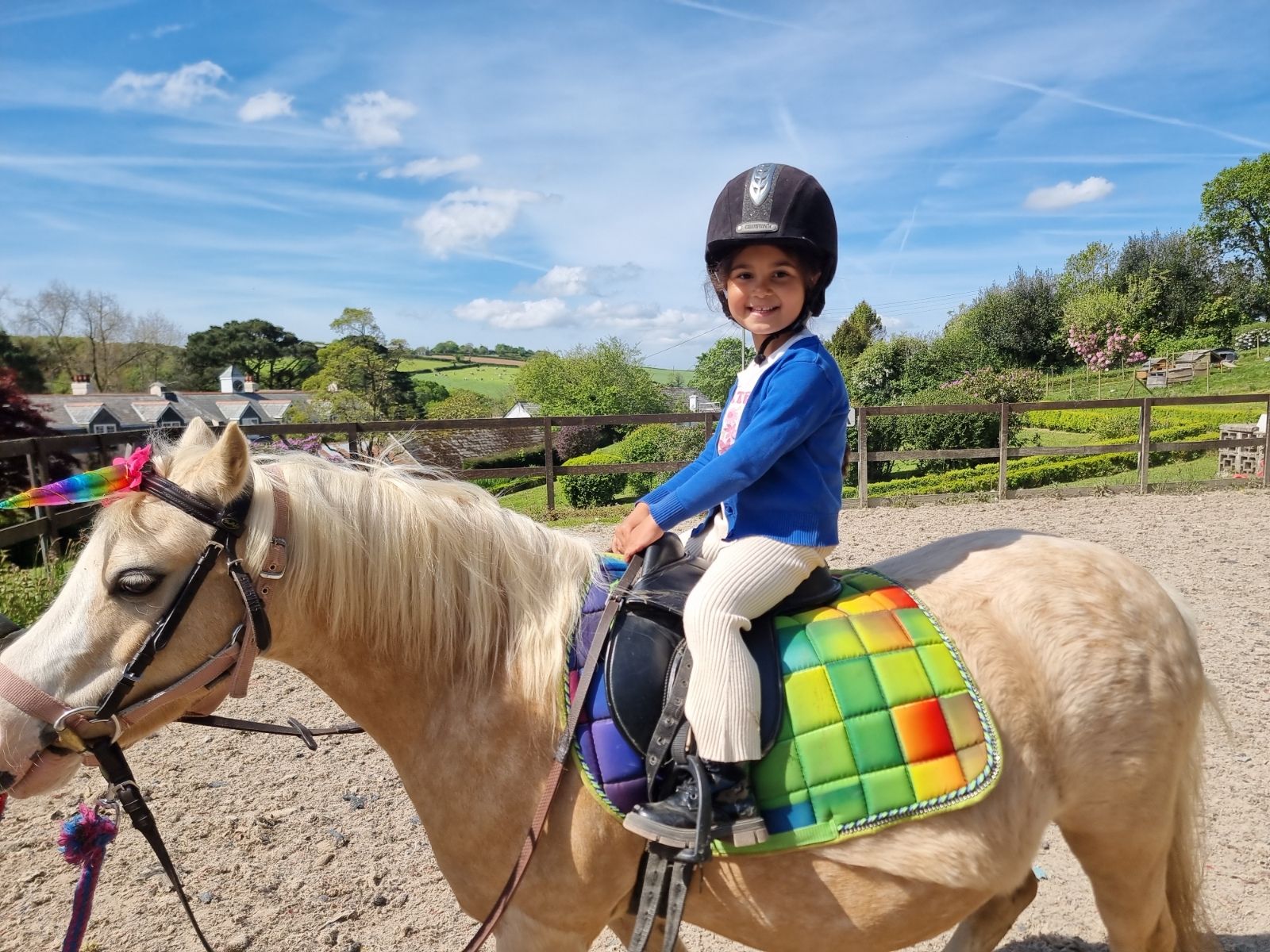 St Nicolas Primary School Pupil riding a pony