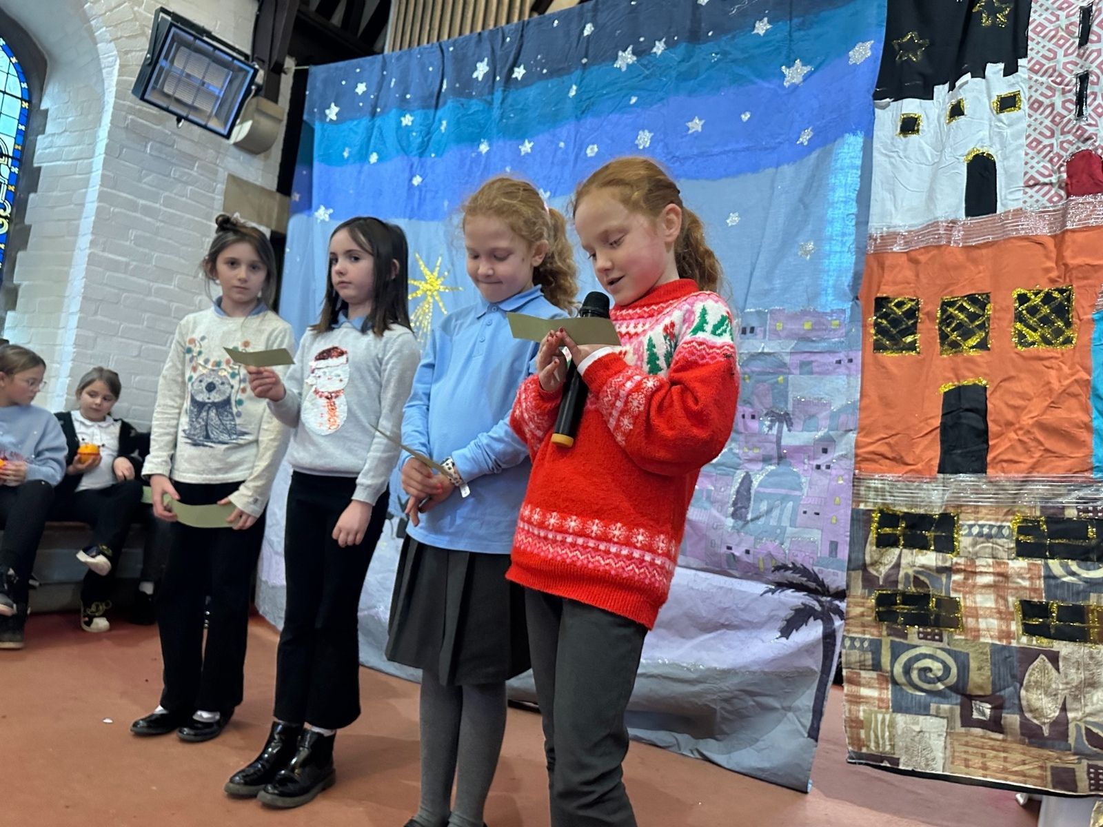 St Nicolas Primary School Pupils reading in church