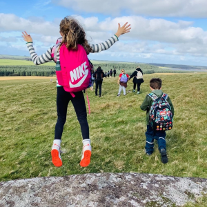St Petrocs Primary School Pupil jumping on the moor