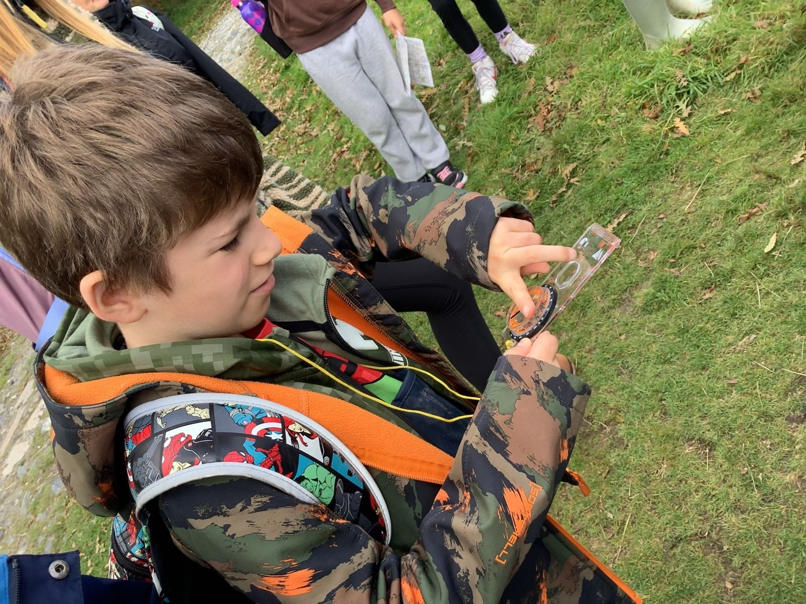 St Petrocs Primary School Pupil using compass