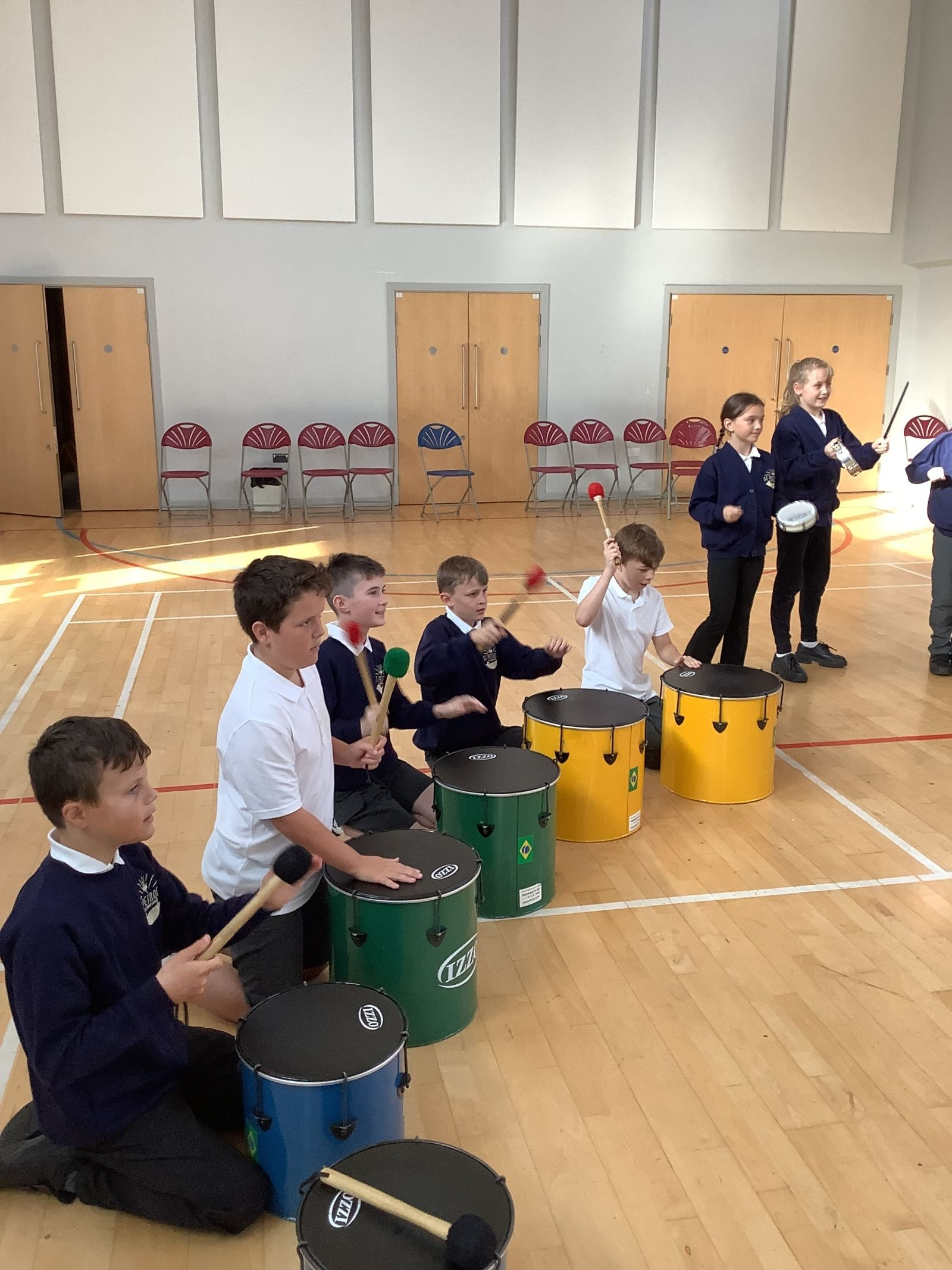 St Petrocs Primary School Pupils playing drums