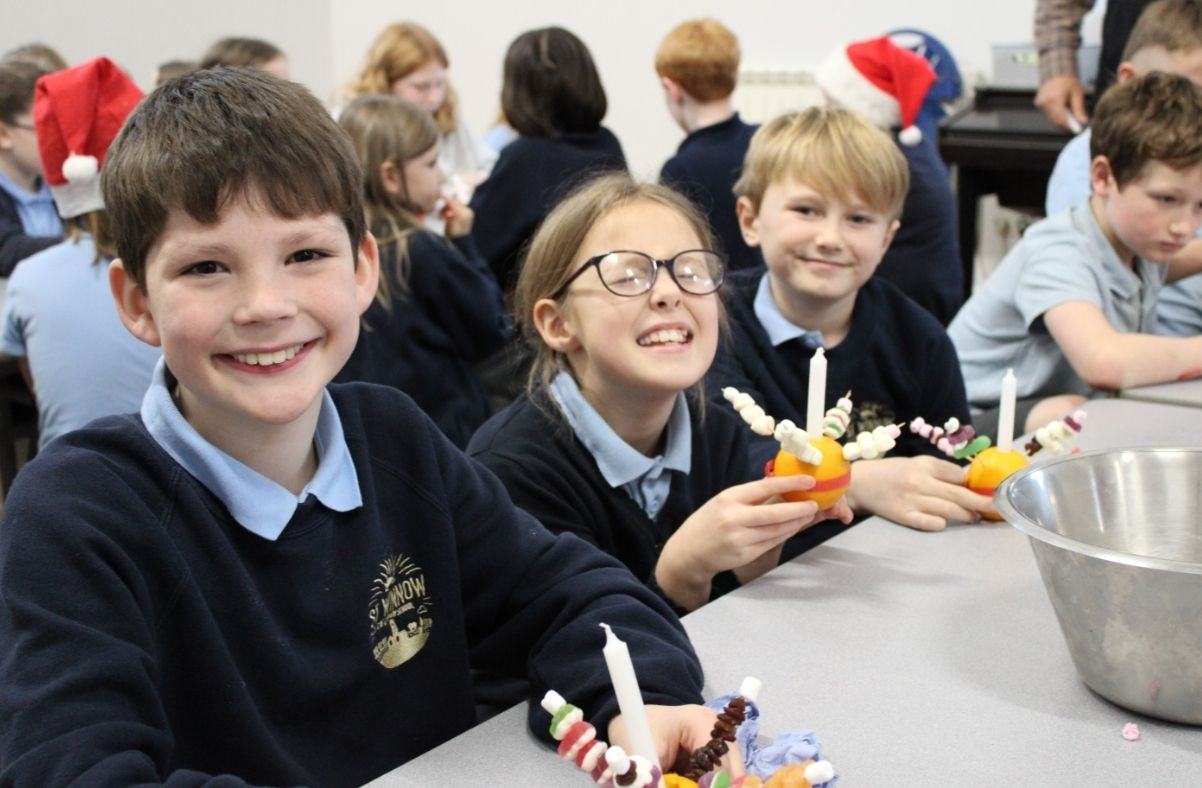 St Winnow Primary School Pupils making christingles