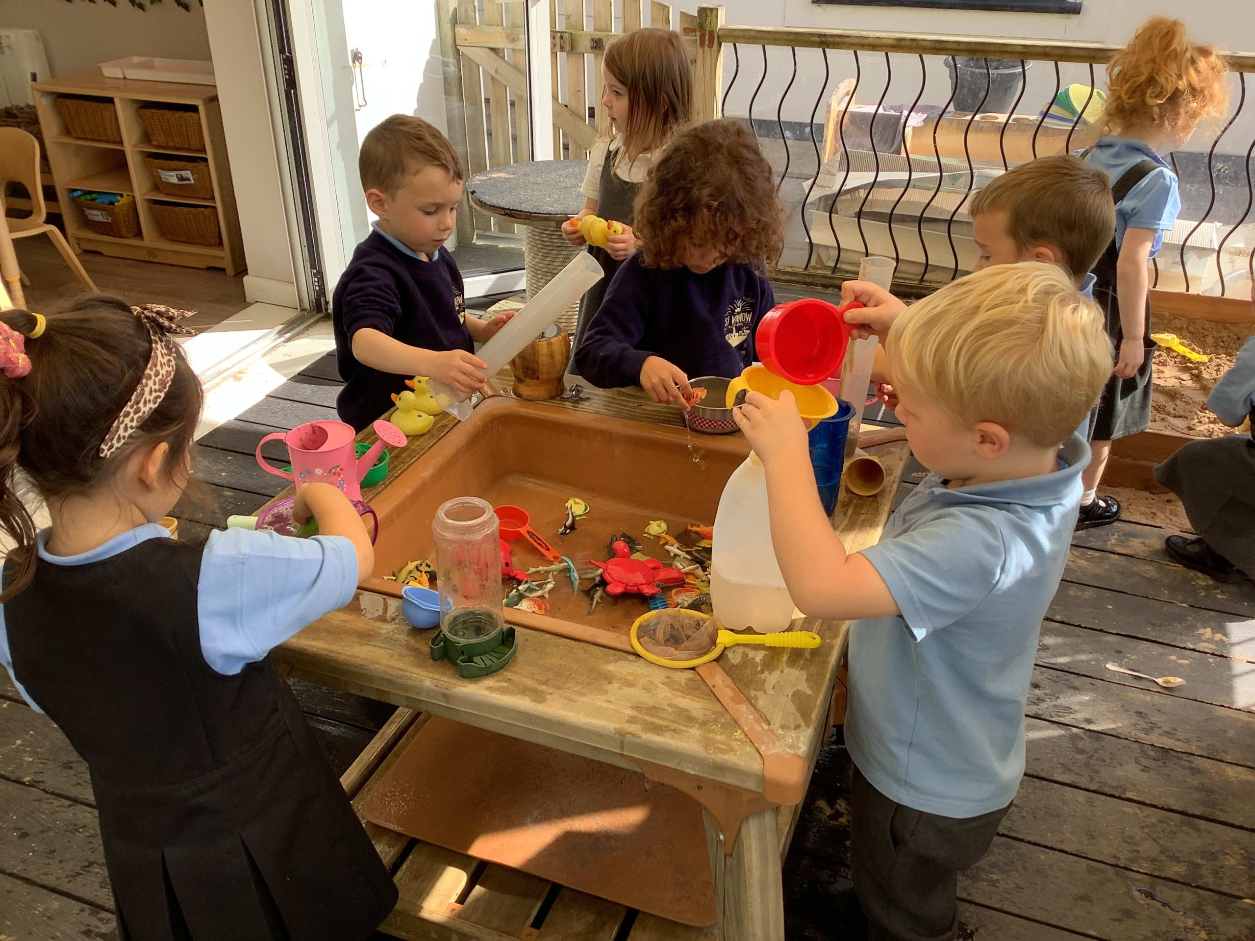 St Winnow Primary School Pupils playing in the messy tray