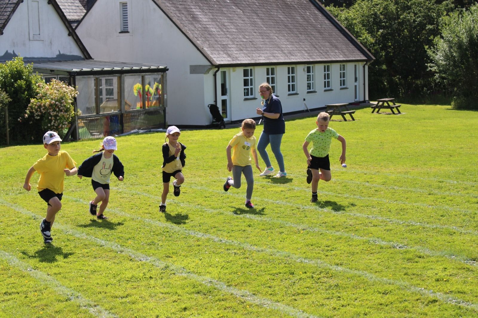 St Winnow Primary School Pupils racing at sports day